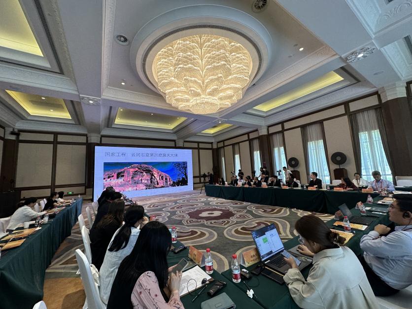 5月30日，“共筑文明共同体——博物馆国际合作新愿景”平行论坛在甘肃敦煌举行。图为论坛现场。（中新社记者丁思 摄）