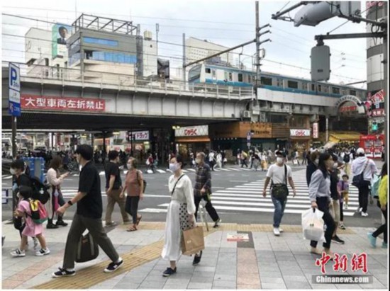 资料图:日本街头 <a target='_blank' data-cke-saved-href='http://www.chinanews.com/' href='http://www.chinanews.com/'><p align=